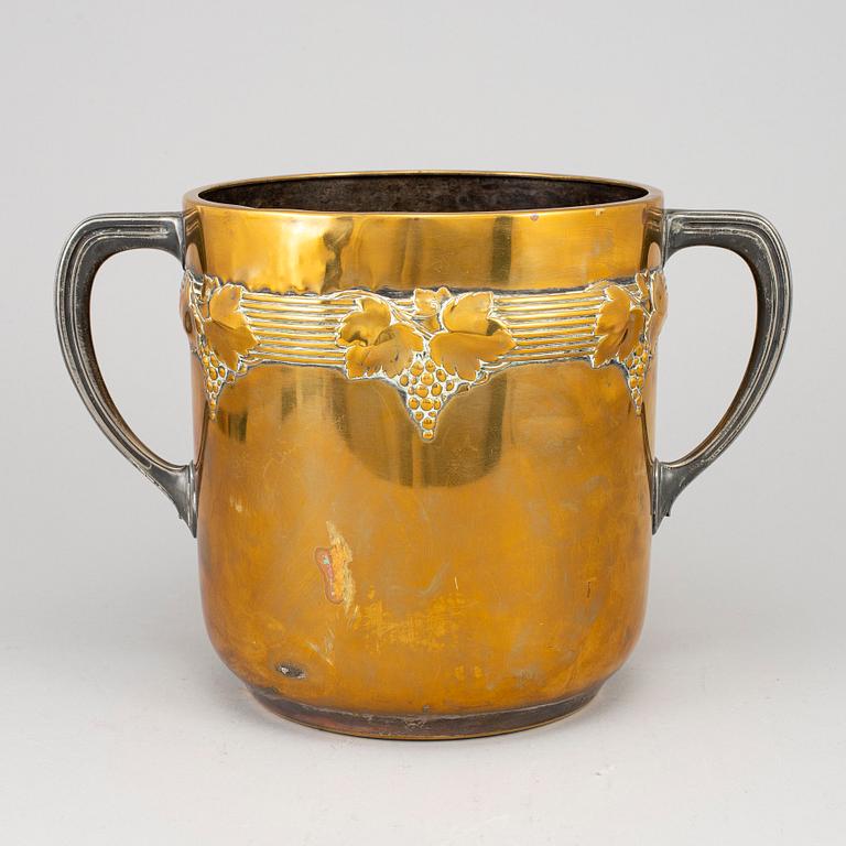 An art nouveau brass champagne cooler, early 20th century.
