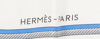 Hermès, a 'Les Voitures à Transformation' silk scarf.