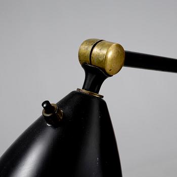 A Greta Magnusson Grossman 'G-33' (Grasshopper) black lacquered floor lamp, Bergboms, Malmö, 1950's.