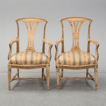 A pair of later part of th 18th century Gustavian arm chairs.