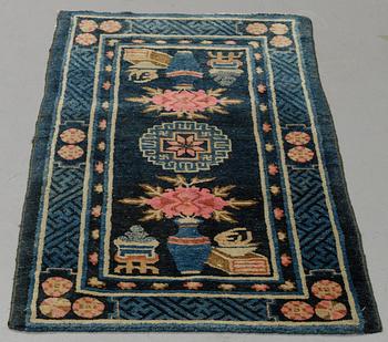 A rug, semi-antique, Baotou, ca 129 x 66 cm.