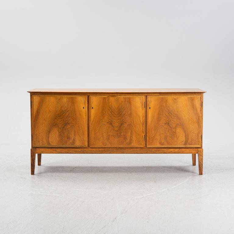 A walnut veneered sideboard, Fritz Hansen, Denmark, mid 20th Century.