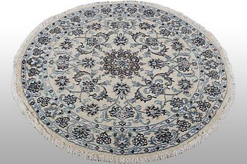 A rug, Nain, part silk, ca 136 x 136 cm.