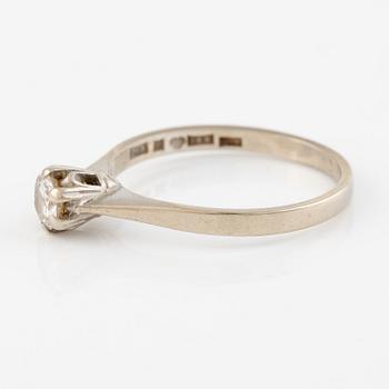 Ring, enstensring, 18K vitguld med briljantslipad diamant.