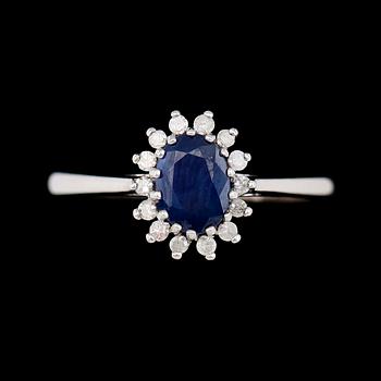 RING, silver, diamanter tot ca 0.15 ct och safir.