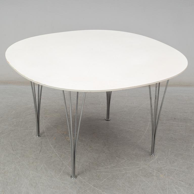 BRUNO MATHSSON & PIET HEIN, and ARNE JACOBSEN, a 'Supercirkel' table and two 'Myran' chairs, from Fritz Hansen.