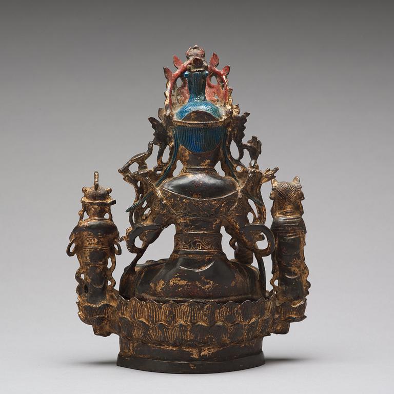 A bronze sculpture of boddhisattva and two attendants, Ming dynasty (1368-1644).