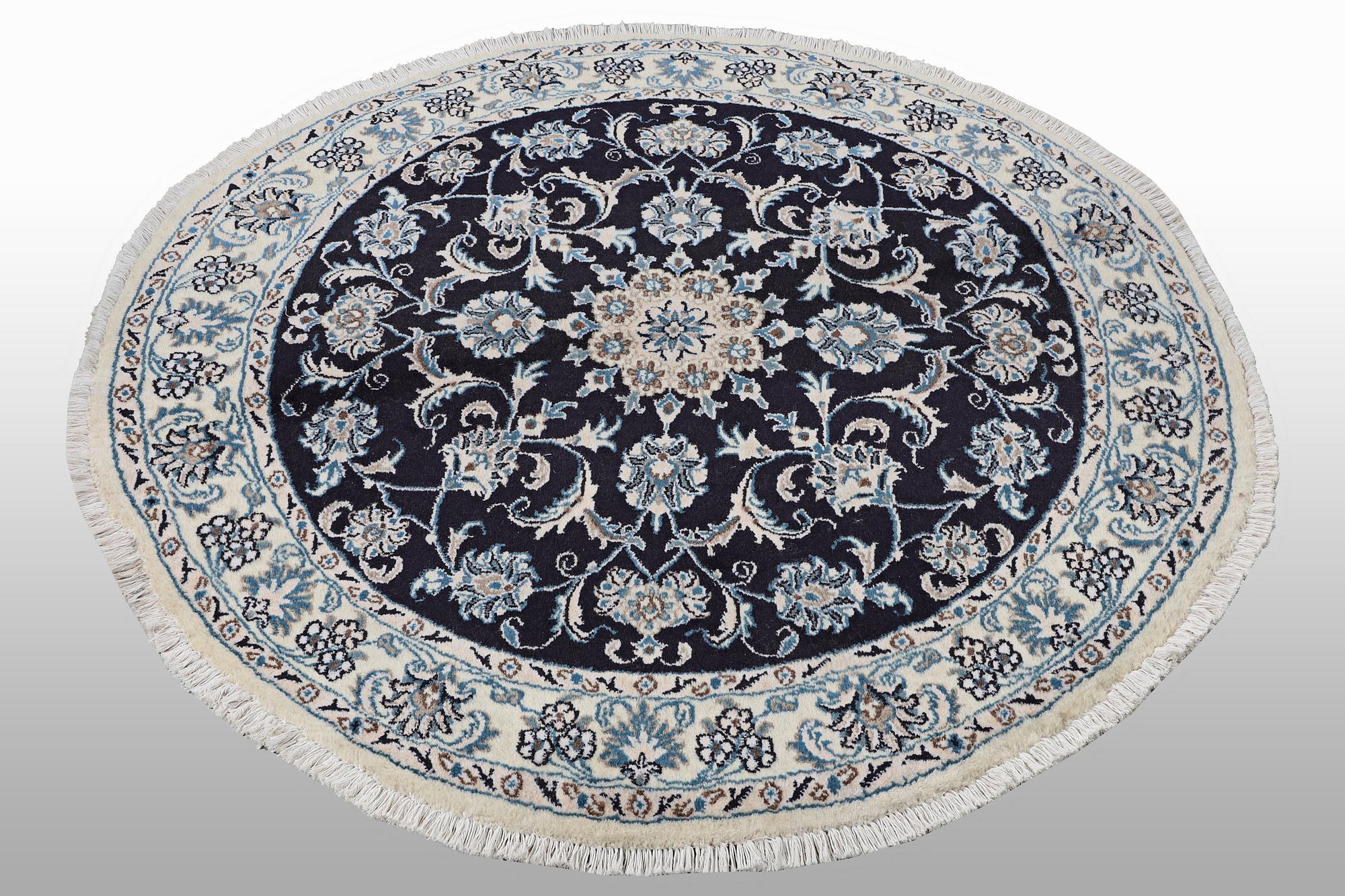 A rug, Nain, part silk, ca 140 x 140 cm.