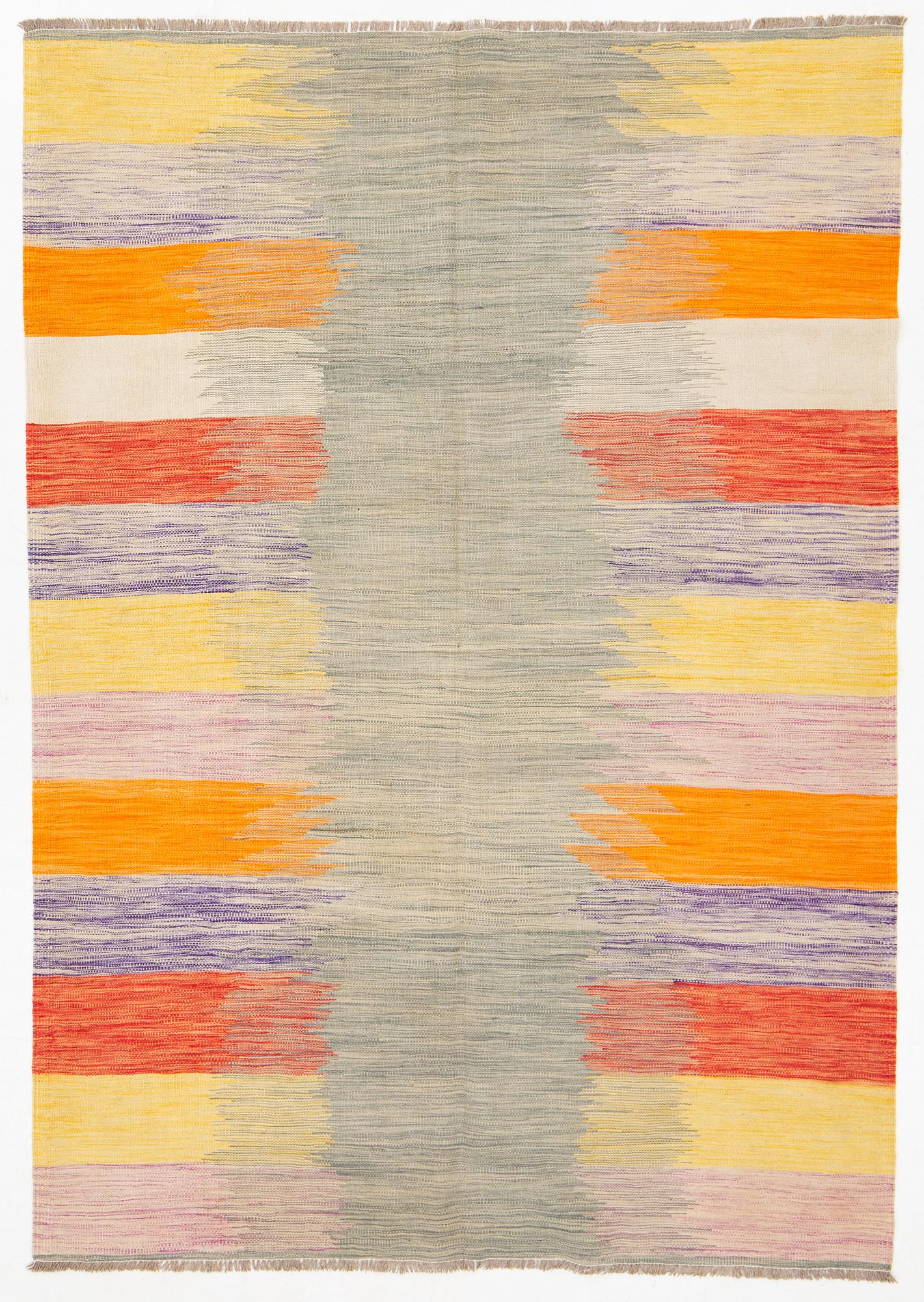 A kilim rug, ca 252 x 175 cm.