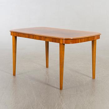 A 1950/60's dining table and chairs.