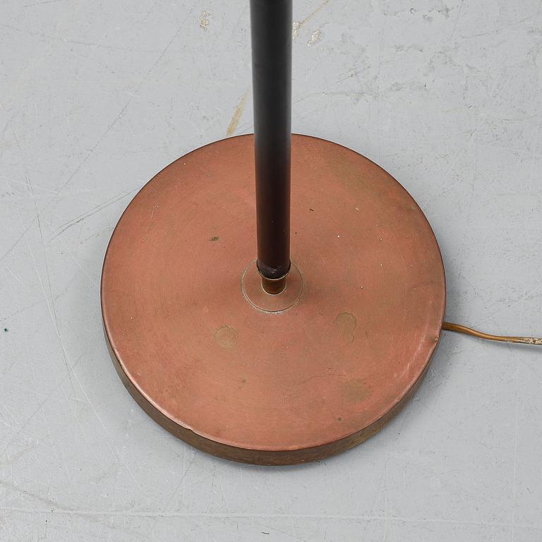 A '7071' floor lamp by Falkenbergs belysning.