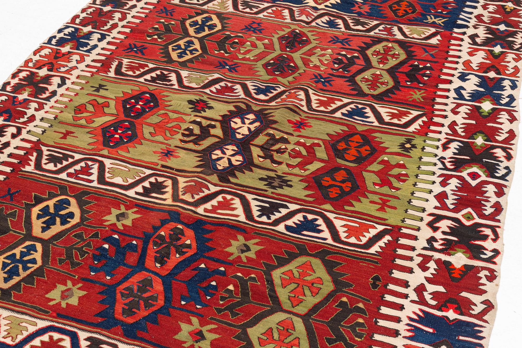 An antique southeast Anatolian kilim, c. 412 x 163 cm.