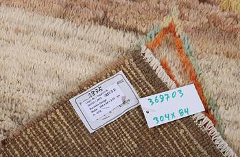 A Moroccan runner carpet, c. 304 x 84 cm.