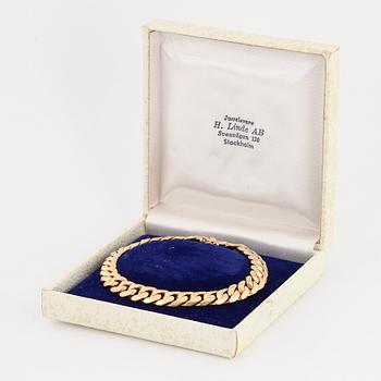 Armband 18K guld manglad pansar.