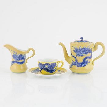 A Japanese teapot, teacup with saucer, and milk jug, porcelain, signed, 20th century.