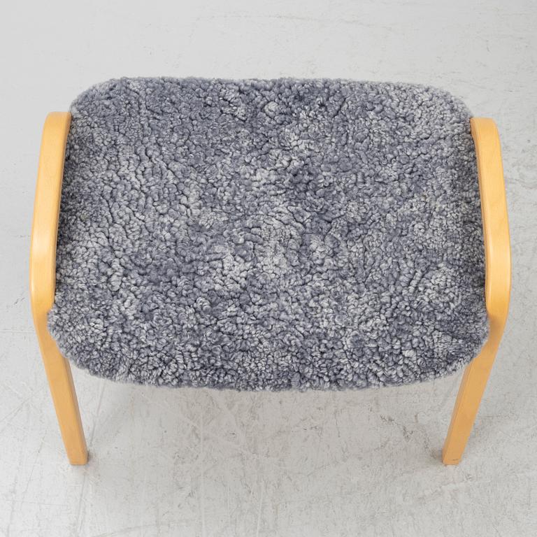 Yngve Ekström, armchair with footstool, Lamino, Swedese.