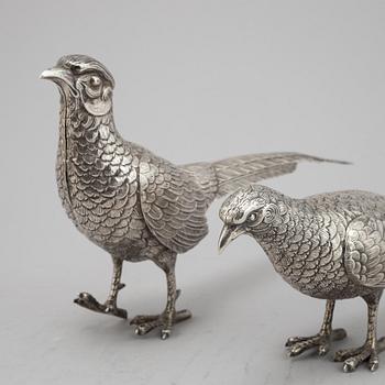 A pair of Spannish 20th century silver pheasants.