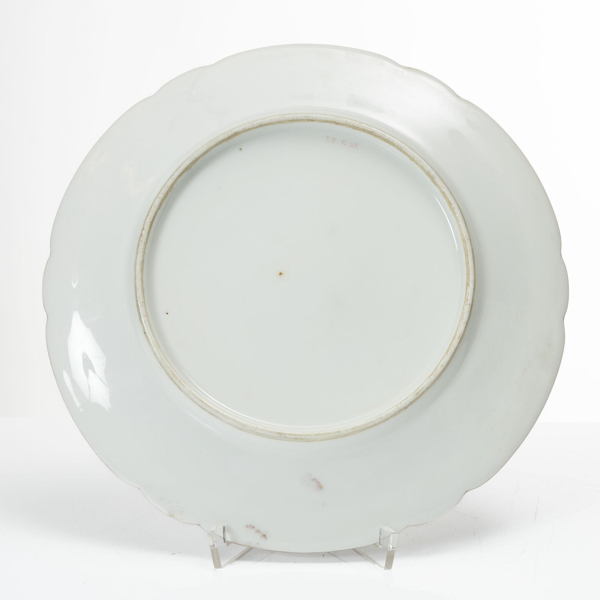 A group of three armorial dinner plates, presumably France, late 19th century.