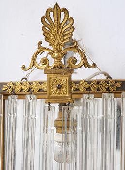 A pair of mirror sconces, 1910's/20's.