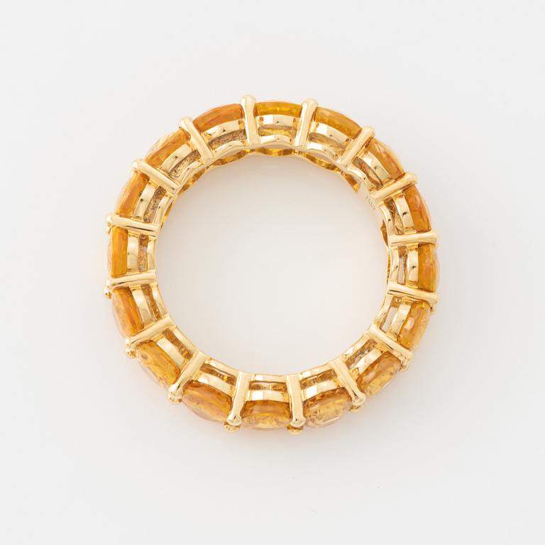 Oval yellow sapphire ring.