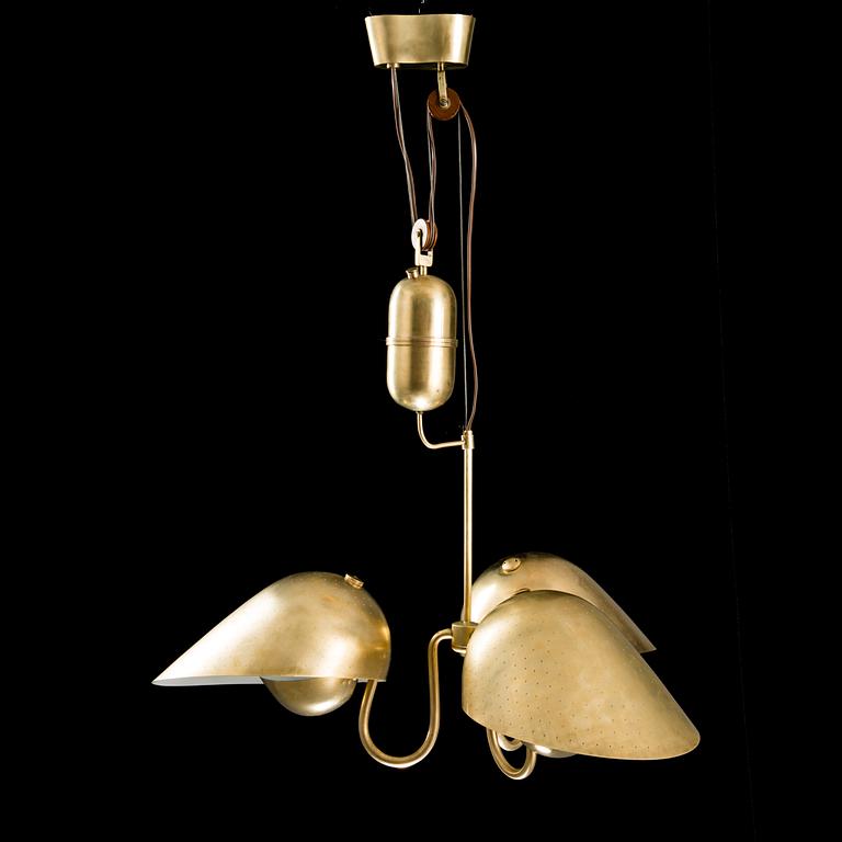 An adjustable pendant light manufactured by Bröderna Malmströms in the 1940s.