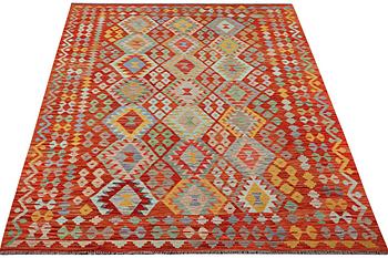 A Kilim carpet, c. 298 x 201 cm.