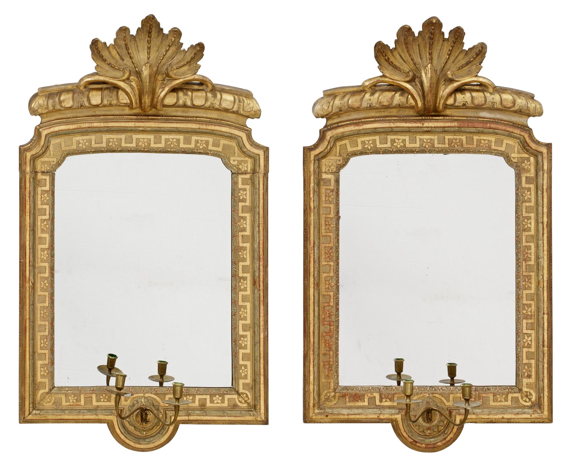 A pair of Gustavian two-light girandole mirrors.