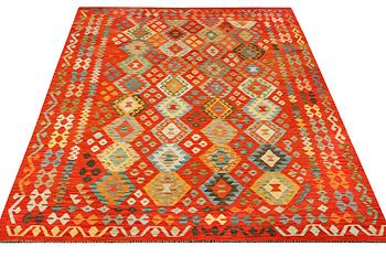 A Kilim carpet, Afghanistan, c. 303 x 206 cm.