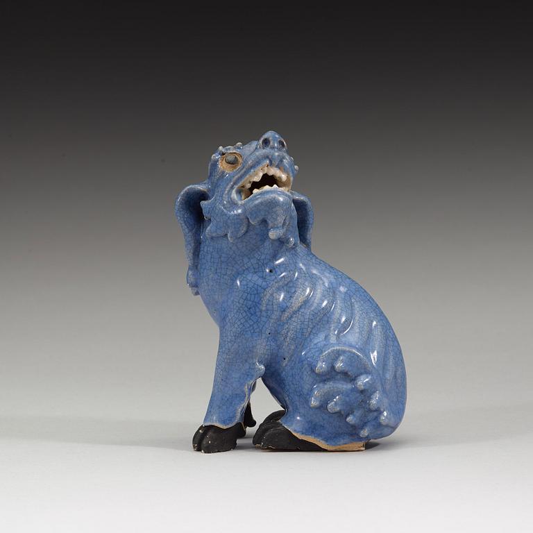 A blue glazed figure of a buddhist lion, Qing dynasty, Qianlong (1736-95).