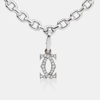 549. A Cartier bracelet, Cartier Logo, with "double C" diamond charm, circa 0.18 ct.