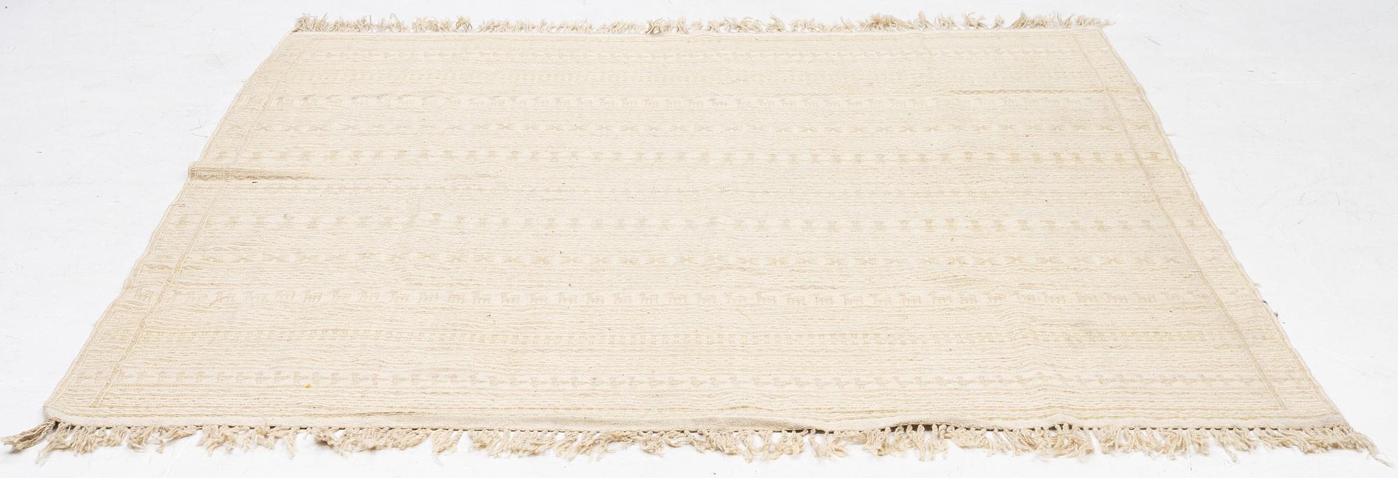 A Kilim part-silk carpet, c. 257 x 241 cm.