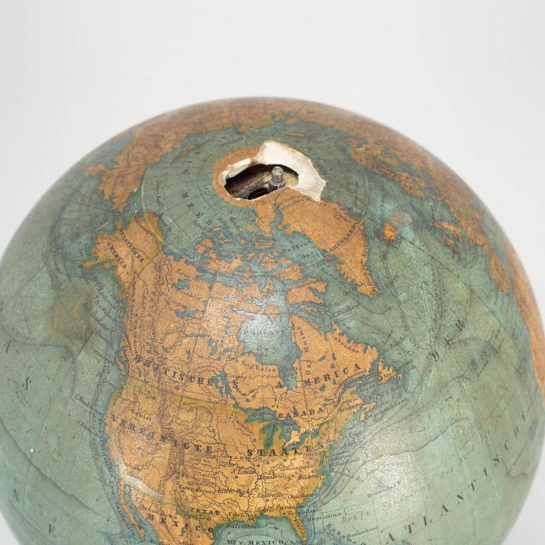 A miniature terrestrial globe, marked Adami Berlin Verlag von Dietrich Reimer 1856,