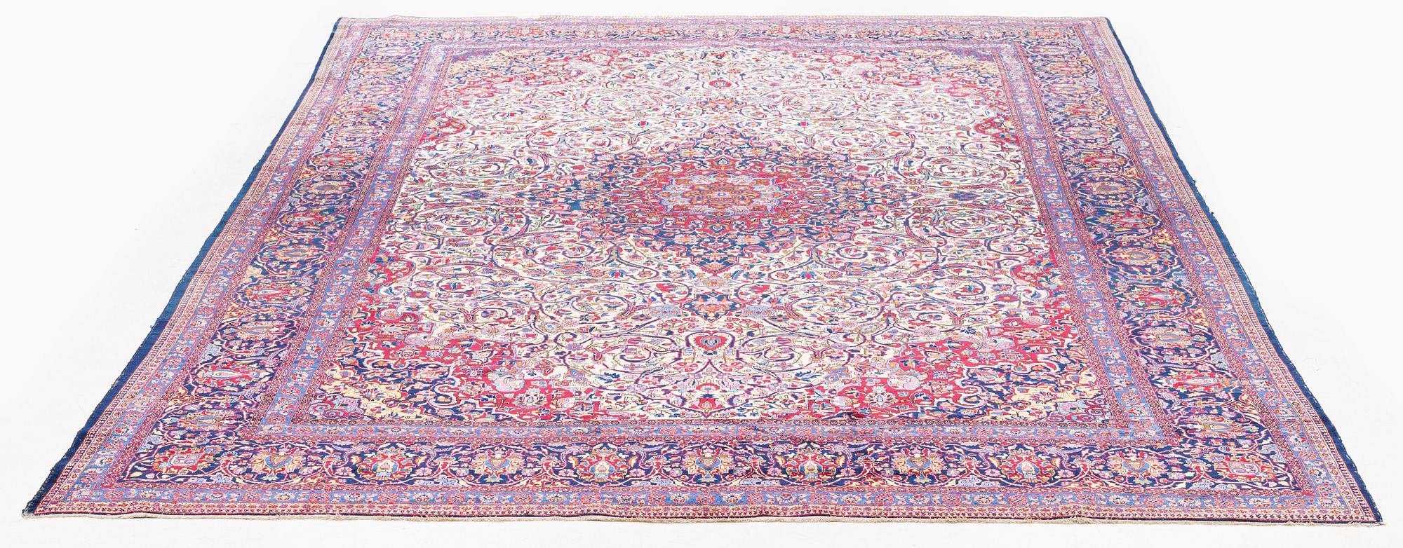 An antique silk Kashan carpet, central Persia (Iran) c. 378 x 259 cm.