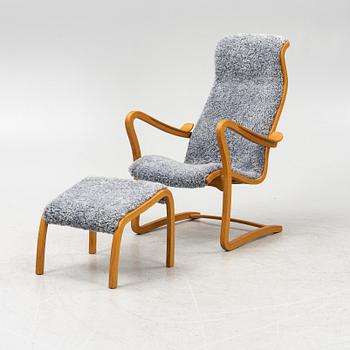 Gustaf Axel Berg, A 'Patronen' shearling armchair and stool, Bröderna Andersson Ekenässjön.