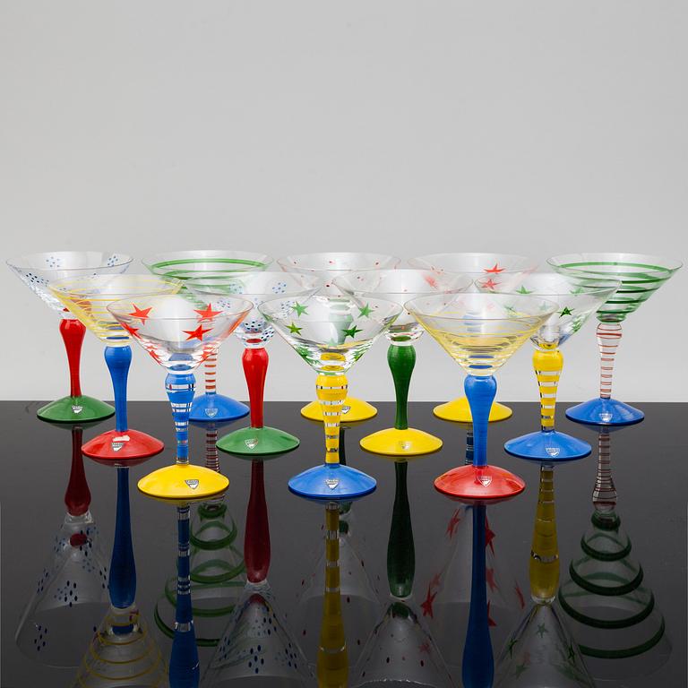 Twelve handpainted and signed 'Clown' martini glasses by Anne Nilsson, Orrefors.