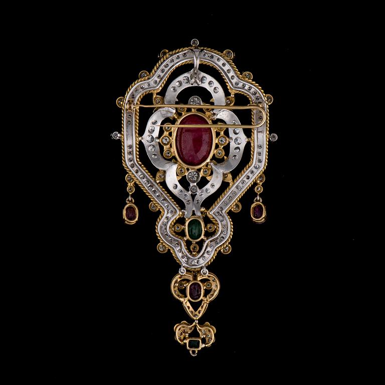 BROSCH / HÄNGE, 18K vitt och gult guld, rubiner, smaragder, diamanter. Iran. Vikt 42,6 g.