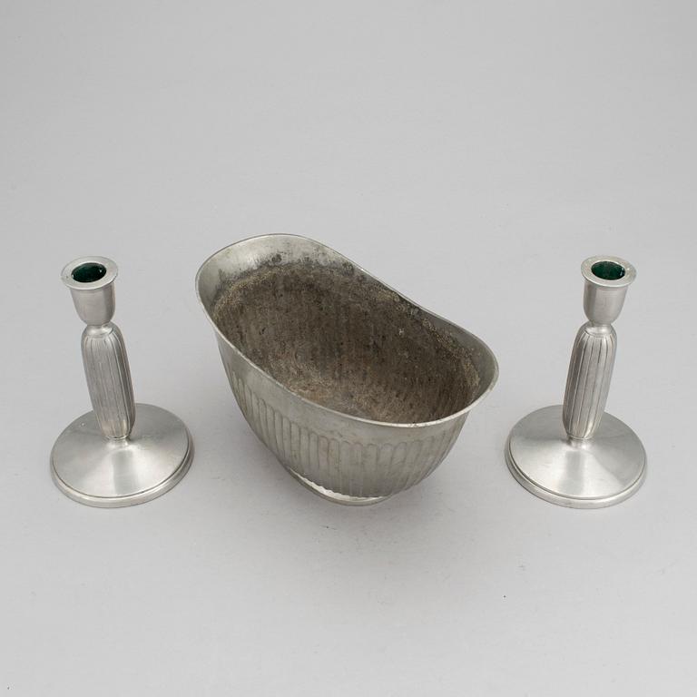 One pewter bowl and a pair of candleholders by Just Andersen, Denmark.
