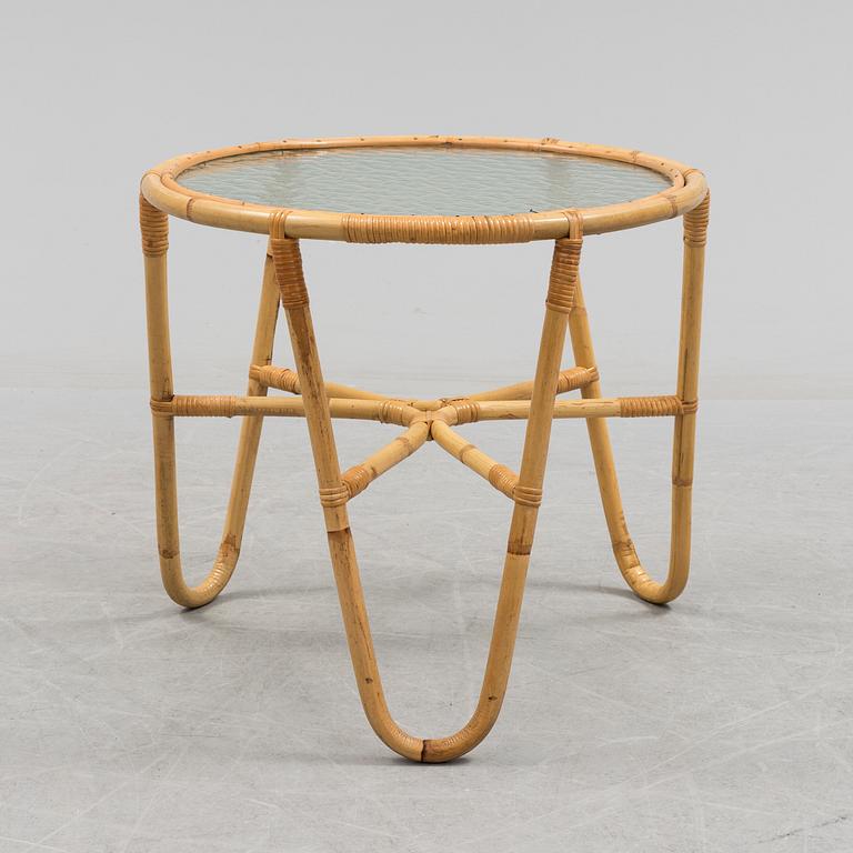 A second half of the 20th century sofa, table and armchairs.