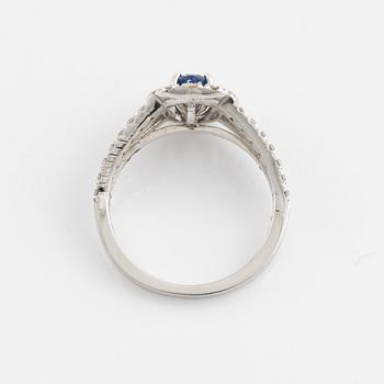Oval sapphire and brilliant cut diamond ring.