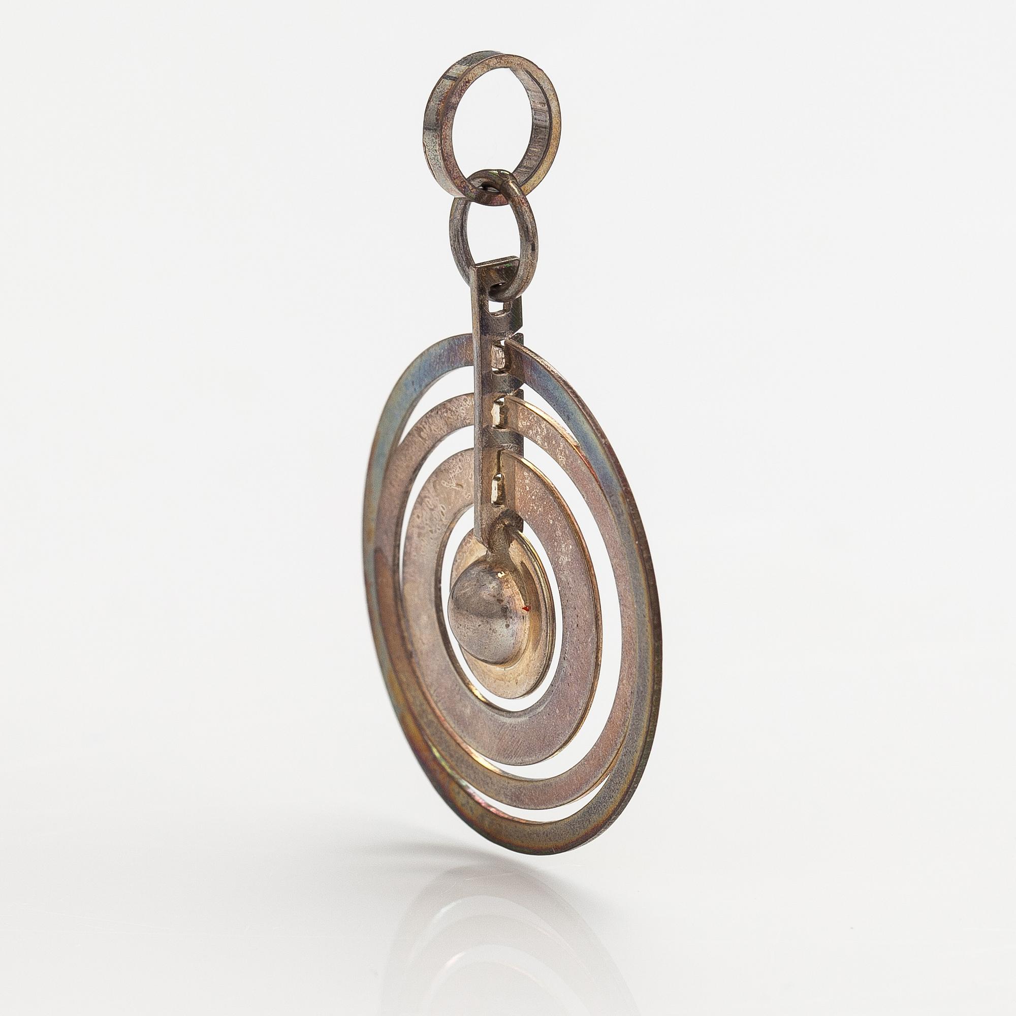 Tapio Wirkkala, A sterling silver pendand "Hopeakuu". Westerback, Helsinki 1971.