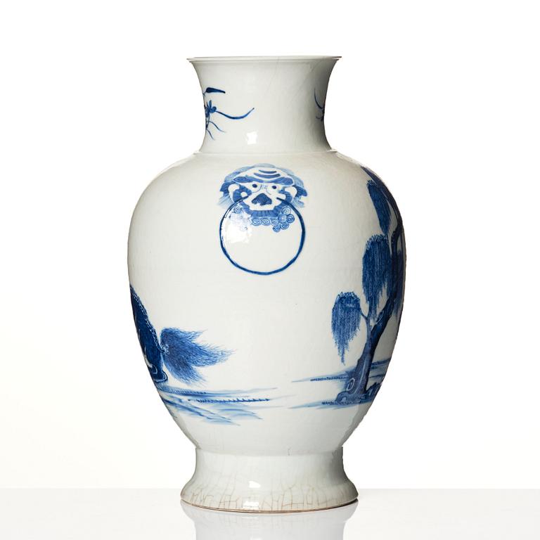 A blue and white bronze shaped vase with mythical creatures, Qing dynasty, 19th Century.