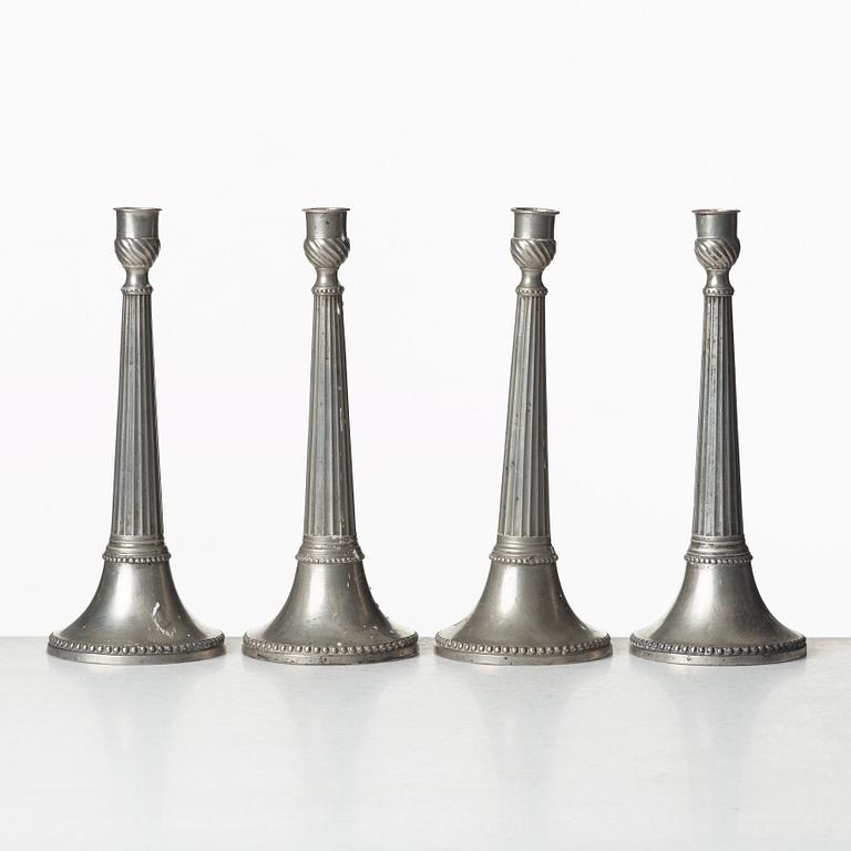 A set of four Swedish late Gustavian pewter candlesticks by E P Krietz, made in Stockholm.