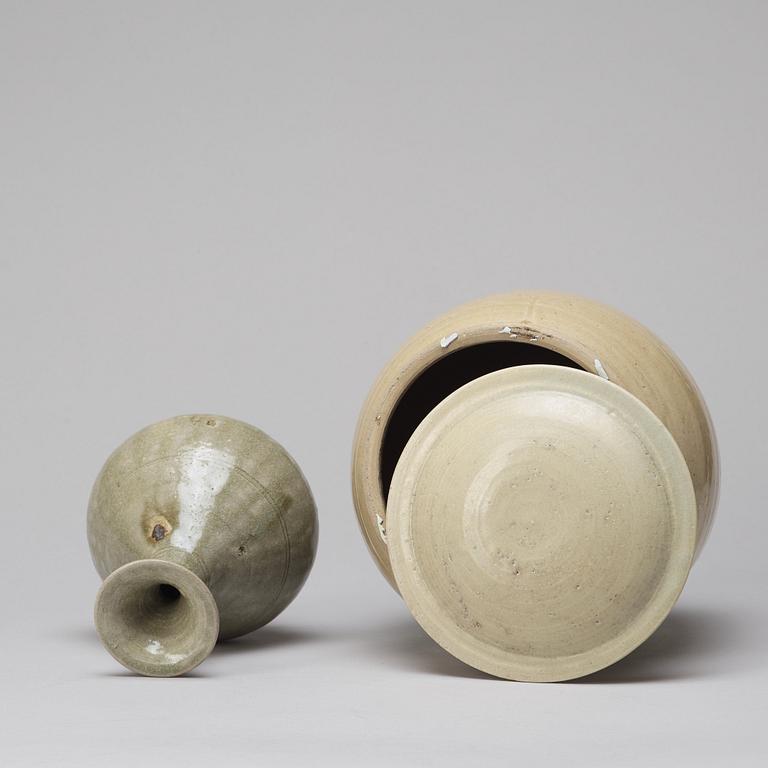 A celadon glazed jar with cover and a vase, South East Asia, 16/17th Century.