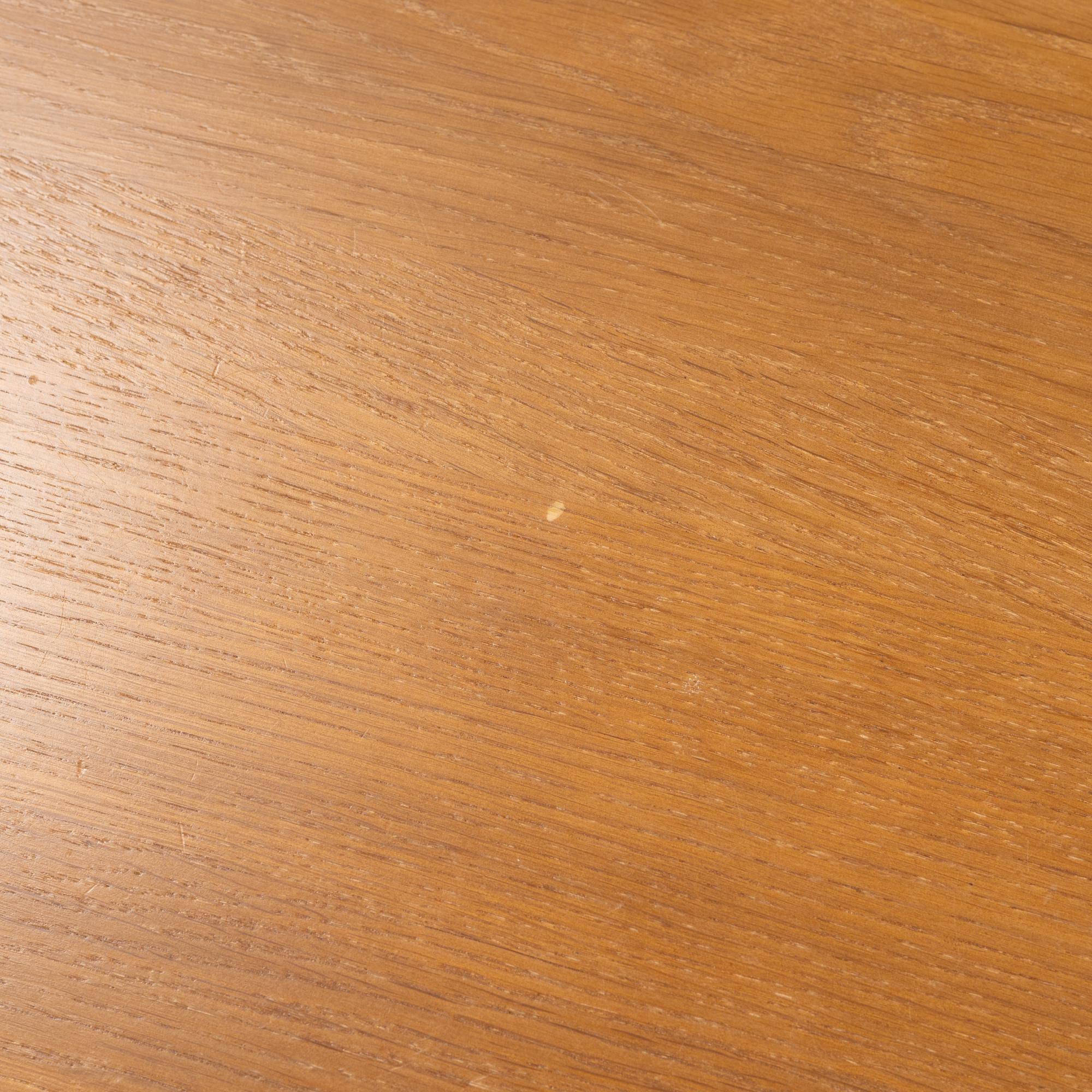 Jonas Lindvall, a stained oak dining table for Stolab.