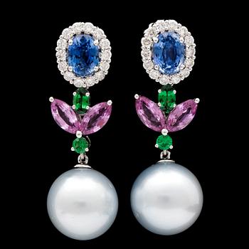 A pair of sapphire, tsavorite and cultured South sea pearl earrings.