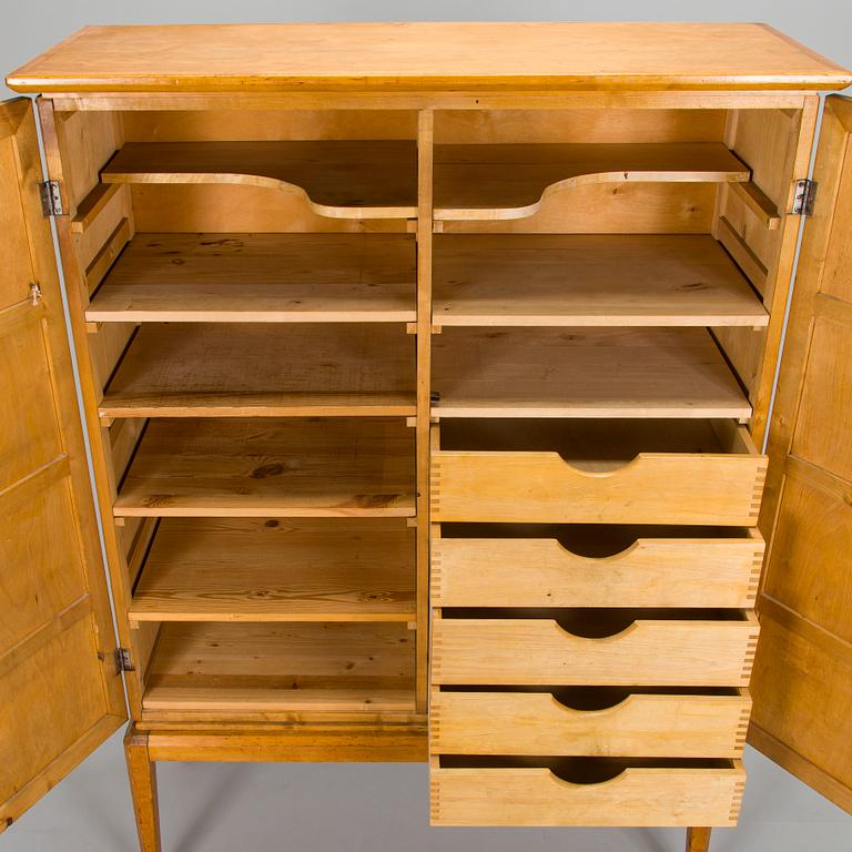 Carl Gustaf Hiort af Ornäs, a mid-1940's cabinet for Hiort Tuote Puunveisto.