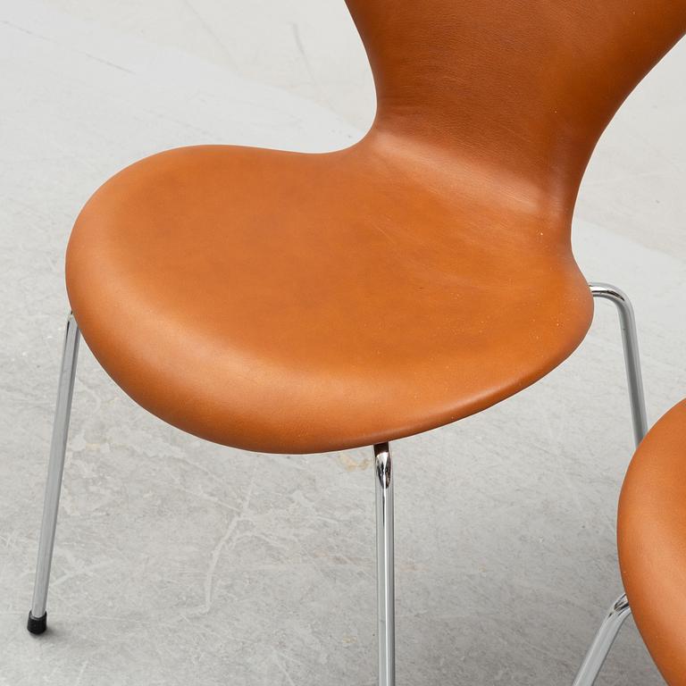 Arne Jacobsen, six leather 'Series 7' chairs, Fritz Hansen, Denmark.
