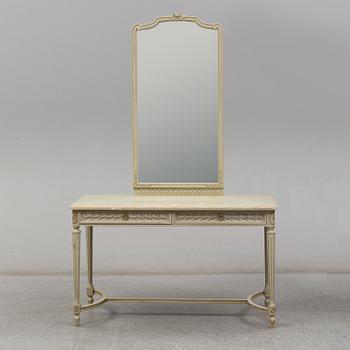 A 1930/40's mirror with table.