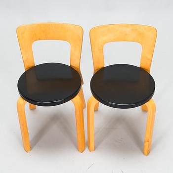 Alvar Aalto, four 1950s chairs, model 65, Artek.