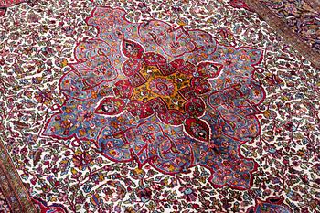 A carpet, oriental silk, approx. 269 x 184 cm.